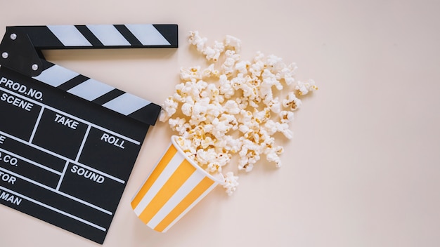 Clapperboard and popcorn