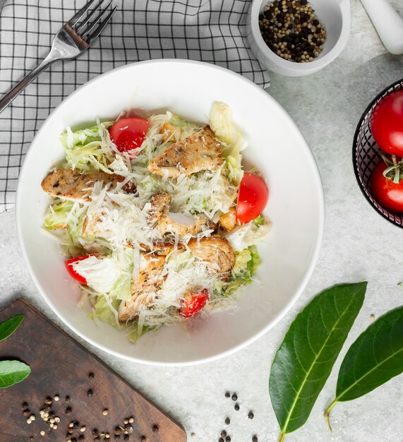 Classic caesar salad with grated cheese