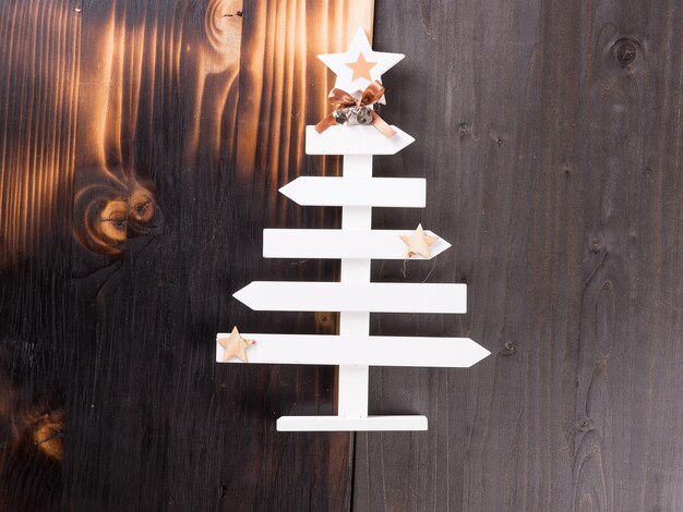 Classic christmas home decoration on wooden background. Handmade decoration