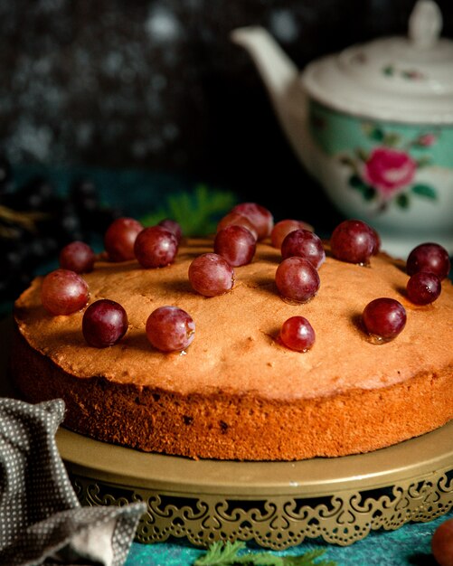 Classic pie decorated with red grapes