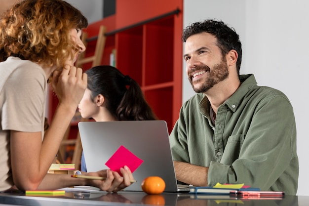 Classmates learning and smiling during study session