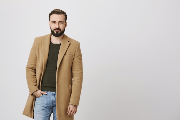 Classy good-looking bearded man smiling