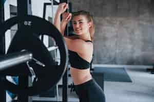 Free photo clean skin.  gorgeous blonde woman in the gym at her weekend time