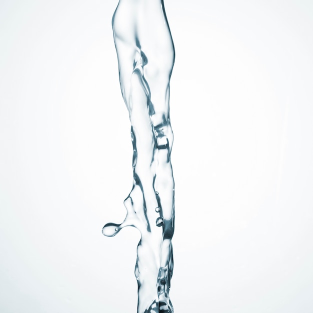 Clean water flowing on white background