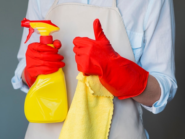 Cleaner holding spray bottle and cloth