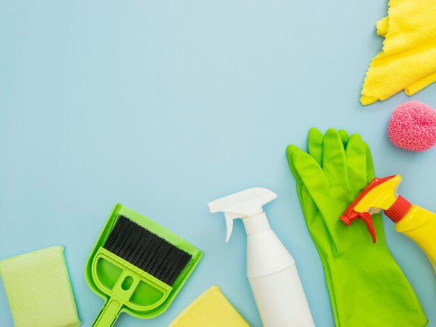 Cleaning supplies on the table with copy space