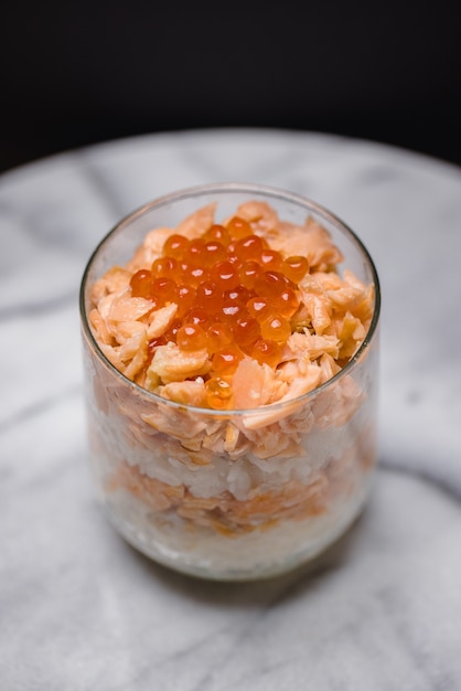 Clear drinking glass with orange liquid