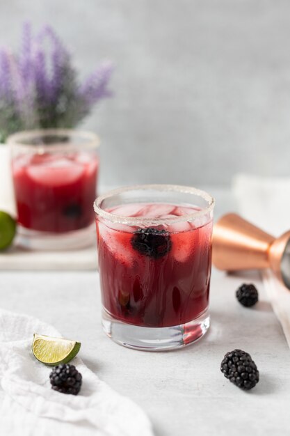 Clear drinking glass with red liquid