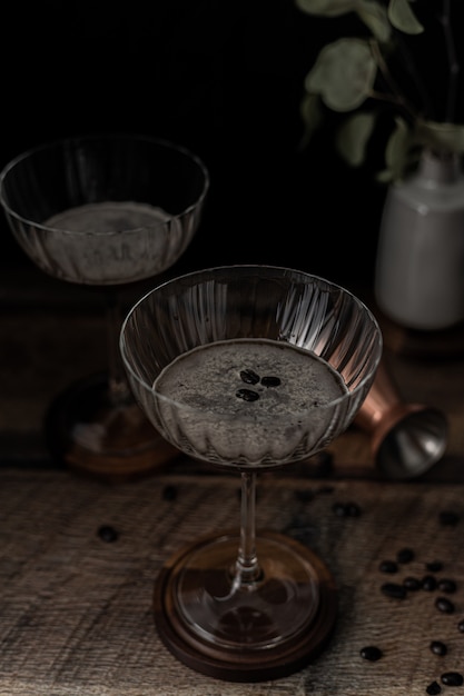 Clear glass cup on brown wooden table