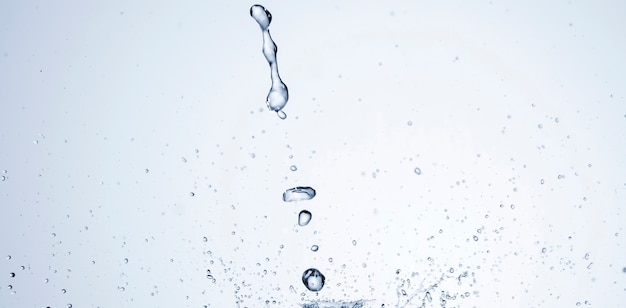 Free photo clear water splash on light background