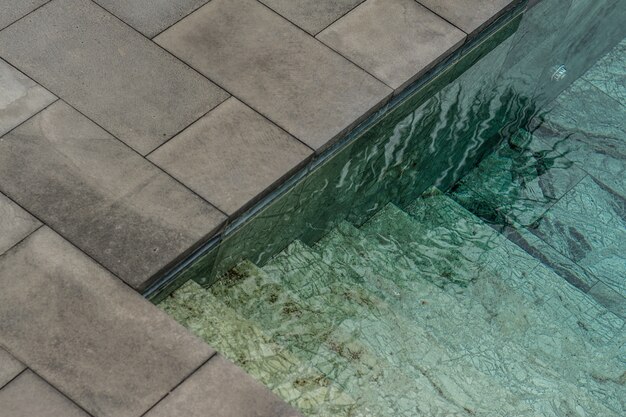 Clear water of a swimming pool during daytime