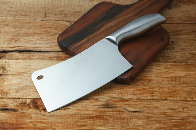 cleaver knife on wooden board