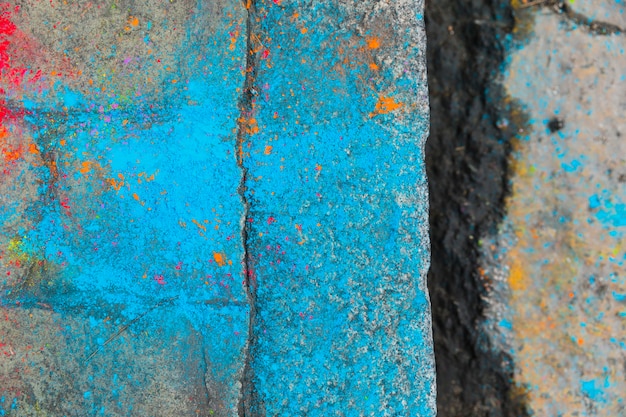 Cleft on paving stone in blue dye