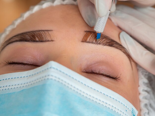 Client going through a microblading treatment