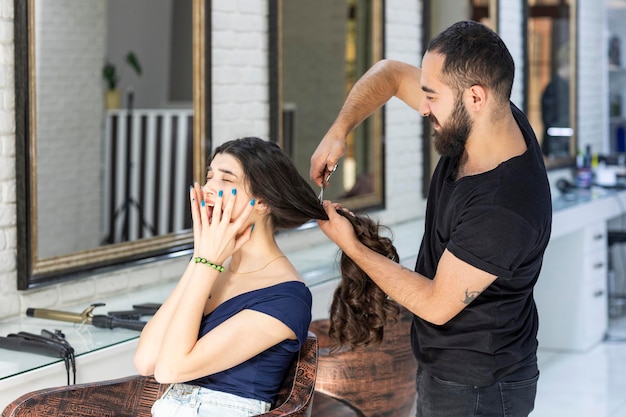 The client is feeling terrified because of cutting her hair High quality photo