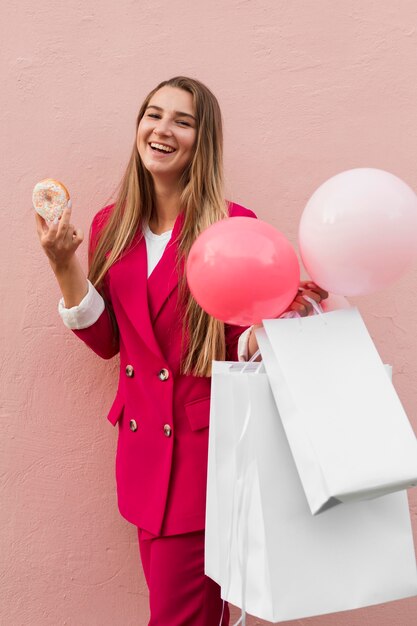 Client wearing fashion clothes holding various objects