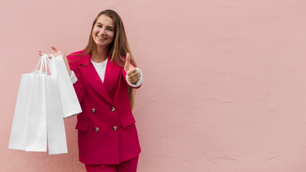 Client wearing fashion clothes thumbs up