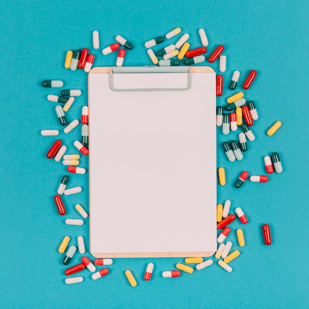 Clipboard and colorful pills