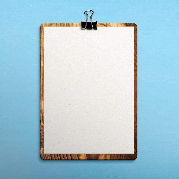 Free photo clipboard on fabric surface