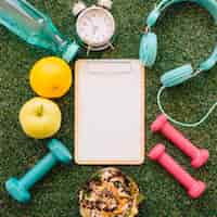 Free photo clipboard and fitness elements