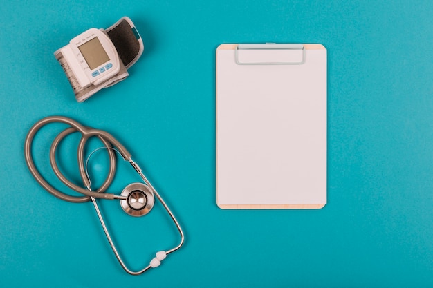 Clipboard next to medical equipment