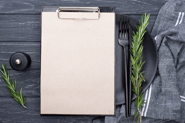 Clipboard on top of table setting