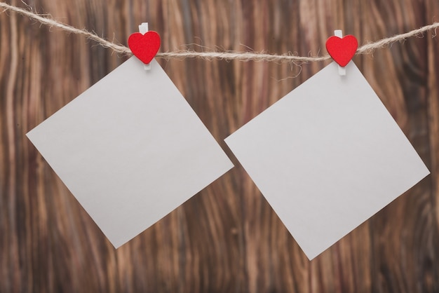 Free photo clipper with a heart holding blank papers