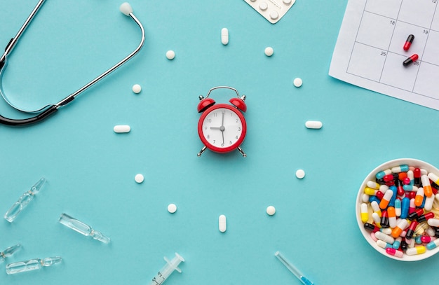 Clock shape of pills on desk