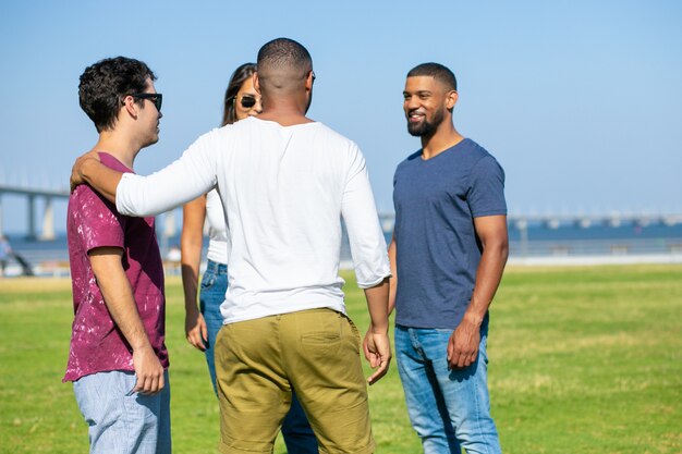 Close friends meeting outside