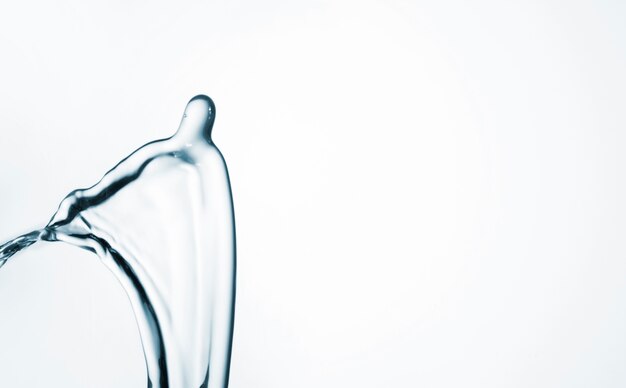 Close-up abstract water shape on light background with copy space