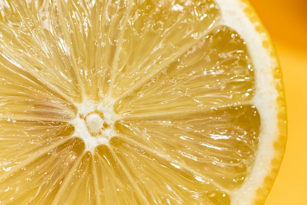 Close-up acid slice of lemon