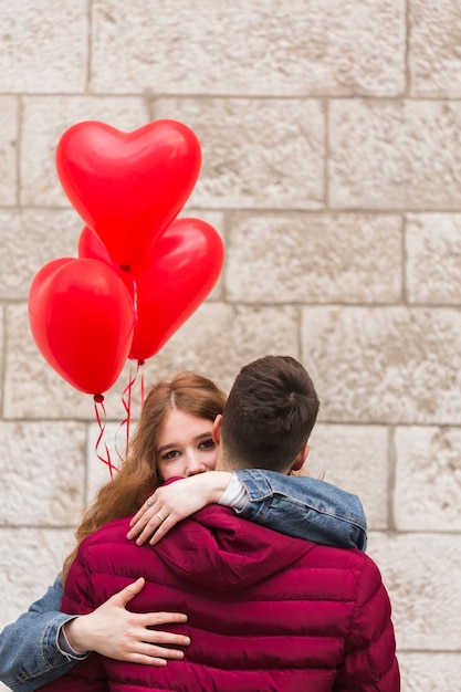 Free photo close up of adorable couple hugging