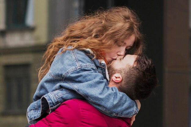 Close up of adorable couple kissing