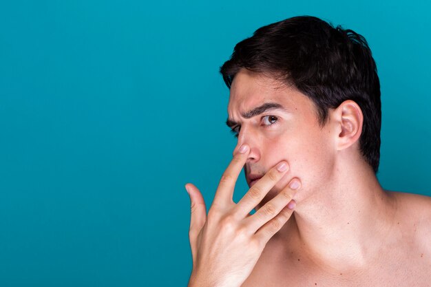 Close-up adult man grooming