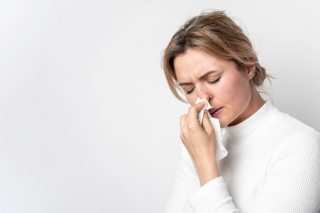 Close-up adult woman with illness symptom