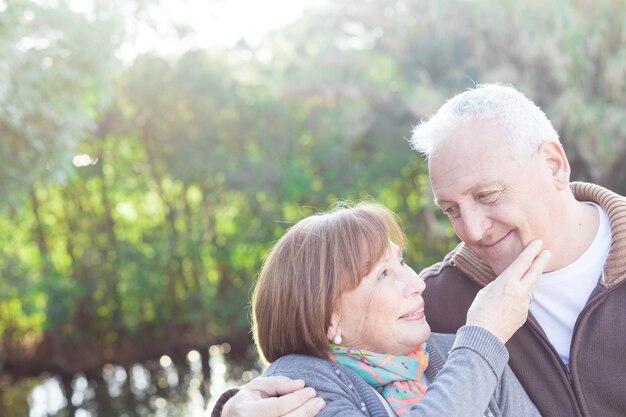 Close-up of affectionate couple outdoors