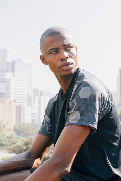 Free photo close-up of a african athlete young man looking away