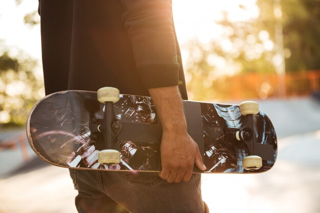 Close up of an african man skateboarder