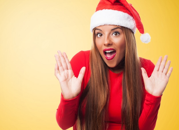 Close-up of amazed woman with open hands