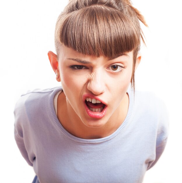 Close-up of amazed young woman