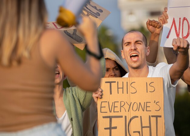 Close up angry people at protest