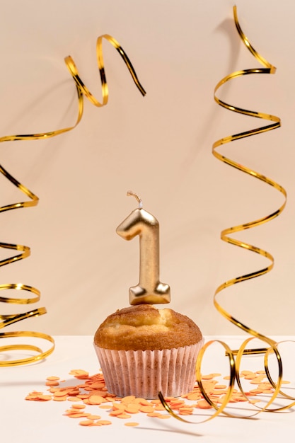 Close-up anniversary cupcake on table