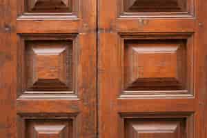 Free photo close-up of antique wooden door