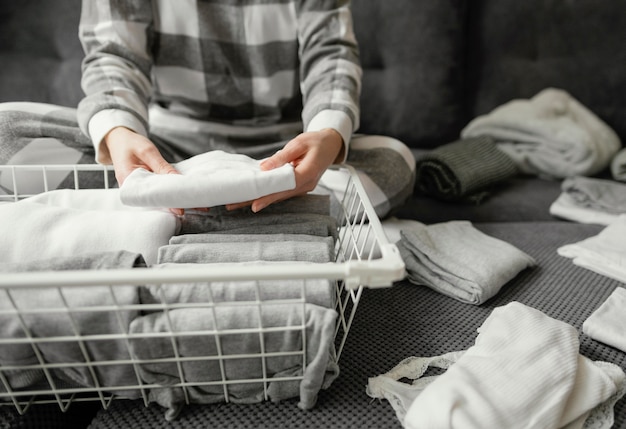 Close up arranging clothes