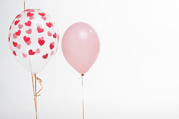 Close-up artistic balloons with heart figures