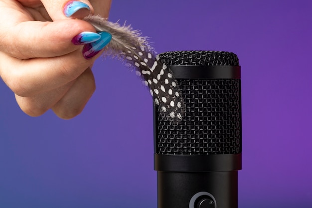 Free photo close up on asmr recording of feather