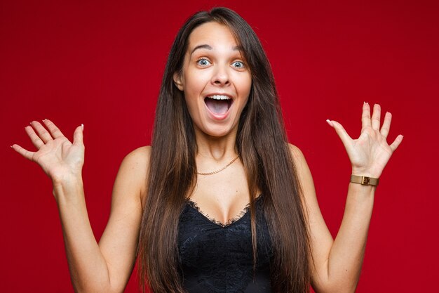 Close up on attractive brunette woman in black top