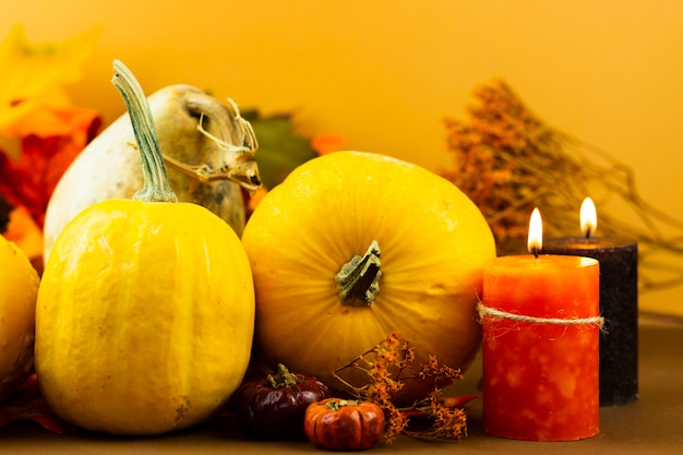 Close-up autumn decorations with candles