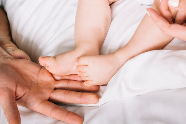 Close up of baby in bed