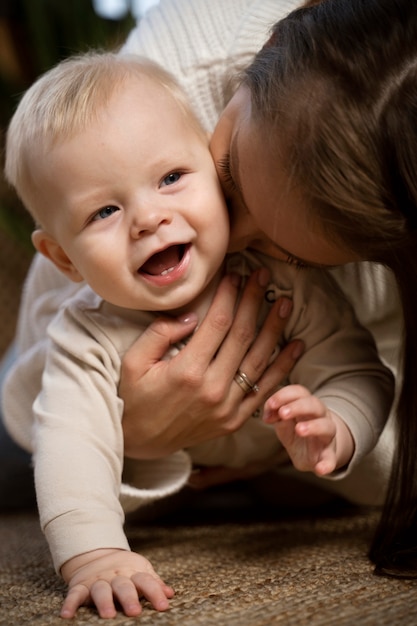 Close up on baby crawling and learning to walk